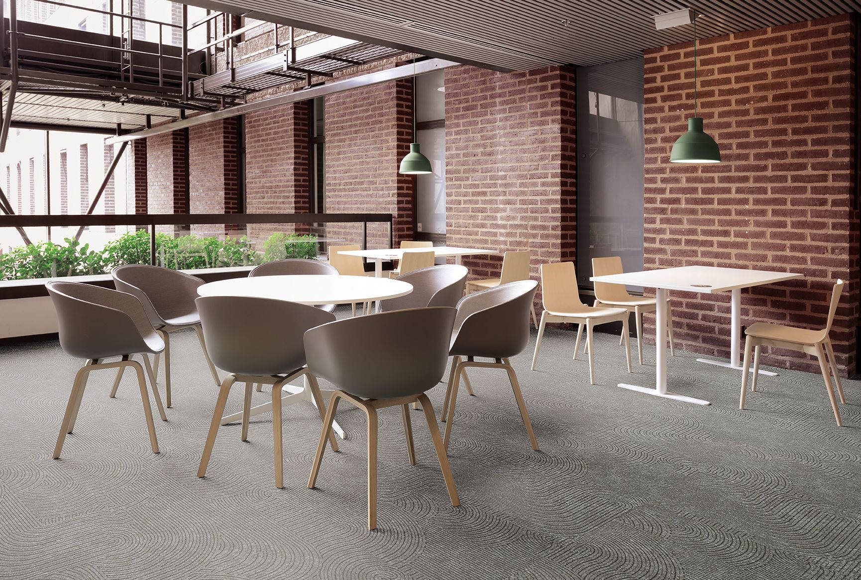 Interface Walk About LVT in building common area with table and chairs image number 3